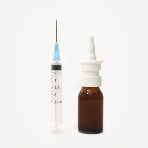 Vial of inhaled vaccine for SARS-CoV-2 for direct application to the lungs without needle and syringe.